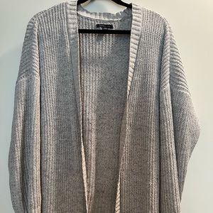 Very soft cardigan. Worn with a couple pulls noted in photos